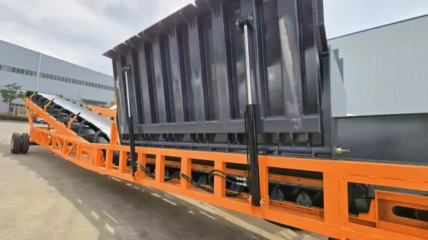 belt truck unloader for bulk material stockpiling